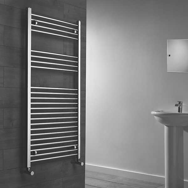Towel radiator on dark grey tiled wall